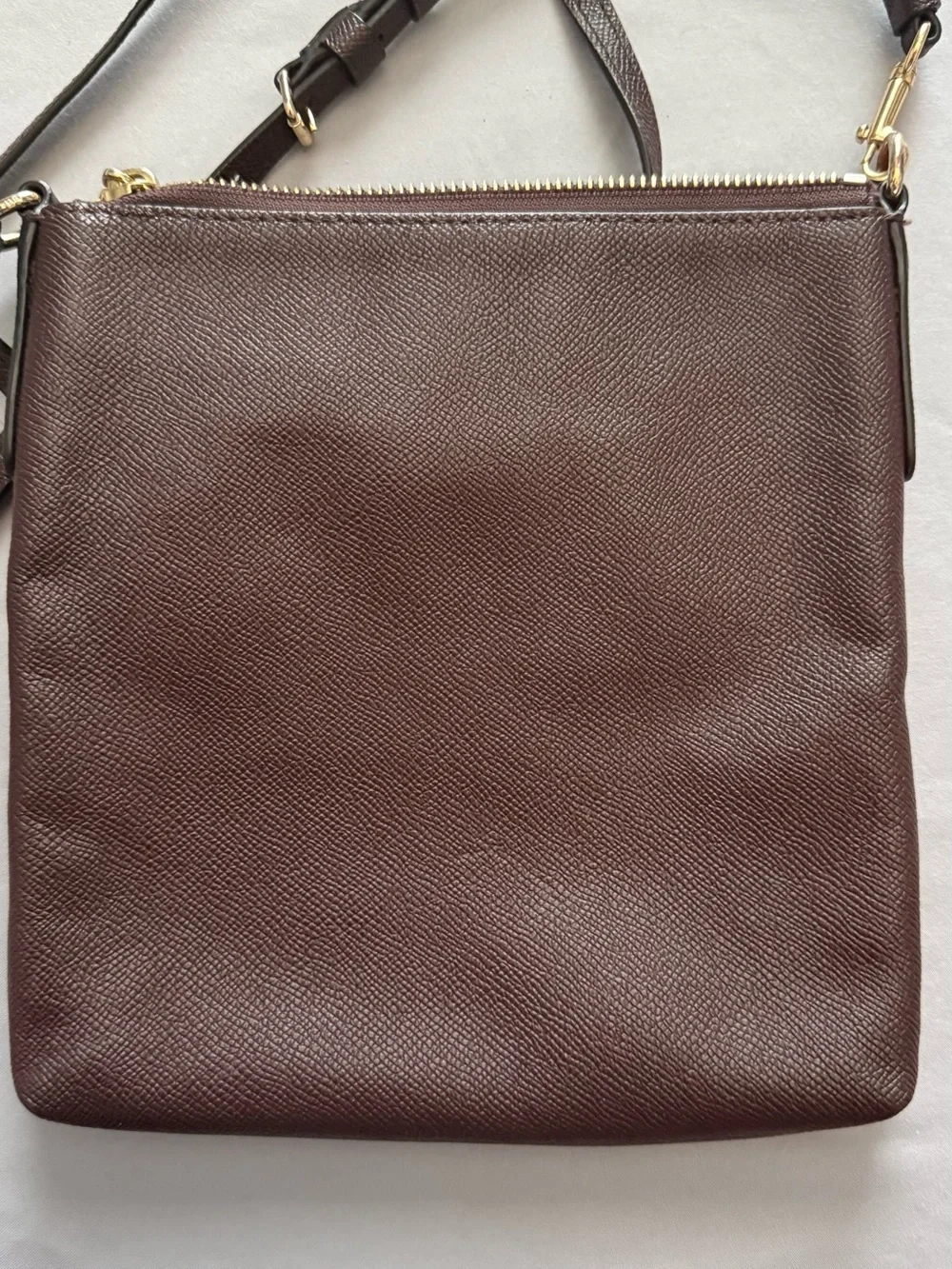 Coach burgundy Pebbled Leather Messenger with Gold Hardware